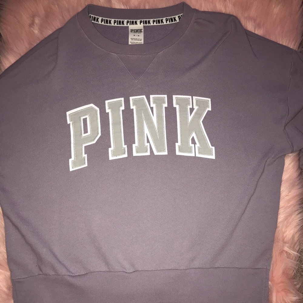 A purple PINK sweater